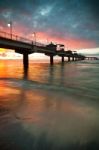 Pier In Sunset Stock Photo