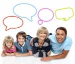 Happy Family With Speech Bubbles Stock Photo