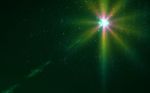 Abstract Green Flare Light On Black Background
 Stock Photo