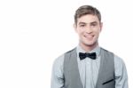 Smart Young Smiling Man With Bowtie Stock Photo