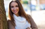 Beautiful Girl Looking At Camera In Autumn Stock Photo