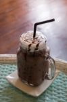 Iced Chocolate On Glass Table Top Stock Photo