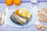 Mackerel Fish With Potato And Carrot Stock Photo