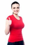 Attractive Girl Showing Thumbs Up Stock Photo