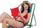 Attractive Bikini Woman Reading A Book Stock Photo