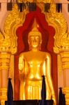 Golden Buddha Statue In The Church Stock Photo