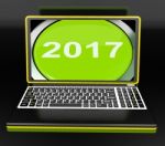 Two Thousand And Seventeen On Laptop Shows New Year 2017 Stock Photo