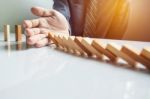 Businessman Hand Stop Dominoes Continuous Toppled Or Risk With C Stock Photo