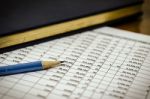 Financial Data Table And Book Stock Photo