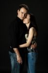 Handsome Young Couple Posing In Studio Stock Photo