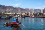 Colourful Wooden Fishing Boats In The Harbour At Antofagasta In Stock Photo