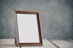 Frame On Wooden Table Stock Photo