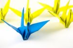 Origami Birds Demonstrate Think Different Concept. Bird Paper Folding Stock Photo