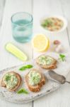 Bread With Tzatziki On The White Wooden Table Vertical Stock Photo