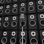 Microphone And Loud Speakers Shows Music Industry Performing Or Stock Photo