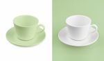 Cup On White & Green Background Stock Photo