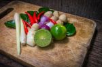 Kaffir Lime Leaf, Lemon, Lemongrass, Galangal, Chili, Onions And Spicy Ingredients Thai Food Stock Photo