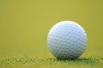 Golf Ball On Green Grass Stock Photo