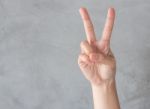 Hand Action Gesture On Grey Background Stock Photo