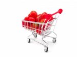 Fresh Grape Or Cherry Tomato In Trolly On White Background Stock Photo