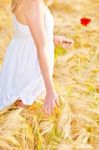 Portrait Of Beautiful Girl In Field Stock Photo