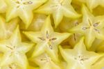 Sliced Star Apple On White Background Stock Photo