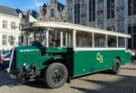 Old Bus In Market Square Bruges Stock Photo