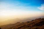 Mountains With Fog And Morning Sun Stock Photo