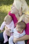 Beautiful Mother Posing With Her Two Kids Stock Photo