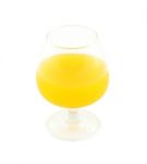 Orange Juice In Brandy Glass On White Background Stock Photo