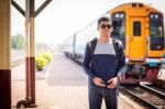 Tourists Man Are Enjoying The Train Station Stock Photo