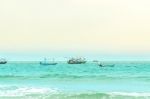 The View Of Sand Beach And Sea Wave On Afternoon Stock Photo