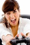 Shouting lady Pressing joystick Stock Photo