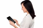 Smiling Woman Using Tablet Pc Stock Photo