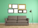 Picture Frame On Wall And Sofa Interior Furniture Design Stock Photo