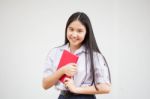 Asia Thai High School Student Uniform Beautiful Girl Read A Book Stock Photo