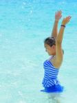 Happy Girl In The Sea Stock Photo