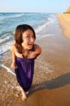 Happy Smiling Girl On The Beach Stock Photo