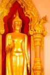 Golden Buddha Statue In The Church Stock Photo