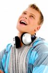 Man With Headphones Around His Neck Stock Photo