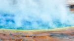 People On The Boardwalk At The Grand Prismatic Spring In Yellows Stock Photo