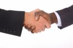 Businessmen Shaking Hands Stock Photo