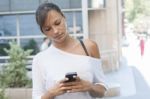 Young Woman Text Messaging Stock Photo