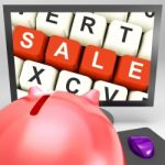 Sale Keys On Monitor Showing Special Promotions Stock Photo