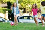 Group Of Childrens Having Fun In The Park Stock Photo