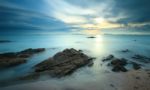 Seascape Sunsset With Fantastic Rock Surface Stock Photo