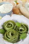 Traditional Italian Raw Homemade Spinach Pasta Stock Photo