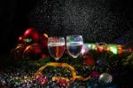 Two Glasses Of Champagne With A Christmas Decor In The Background Stock Photo