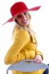 Smiling Woman Sitting On Chair Stock Photo