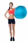 Fitness Trainer Holding Pilates Ball Stock Photo